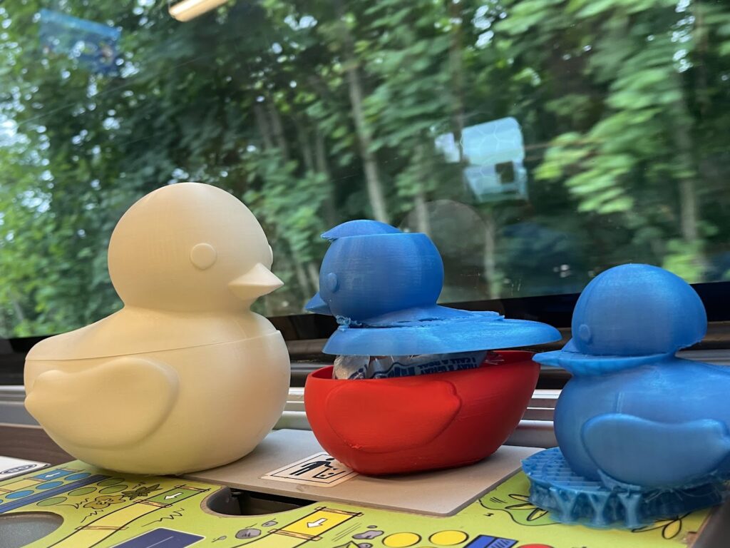 the 3d printed glitch duckie prototypes from the Prusa booth